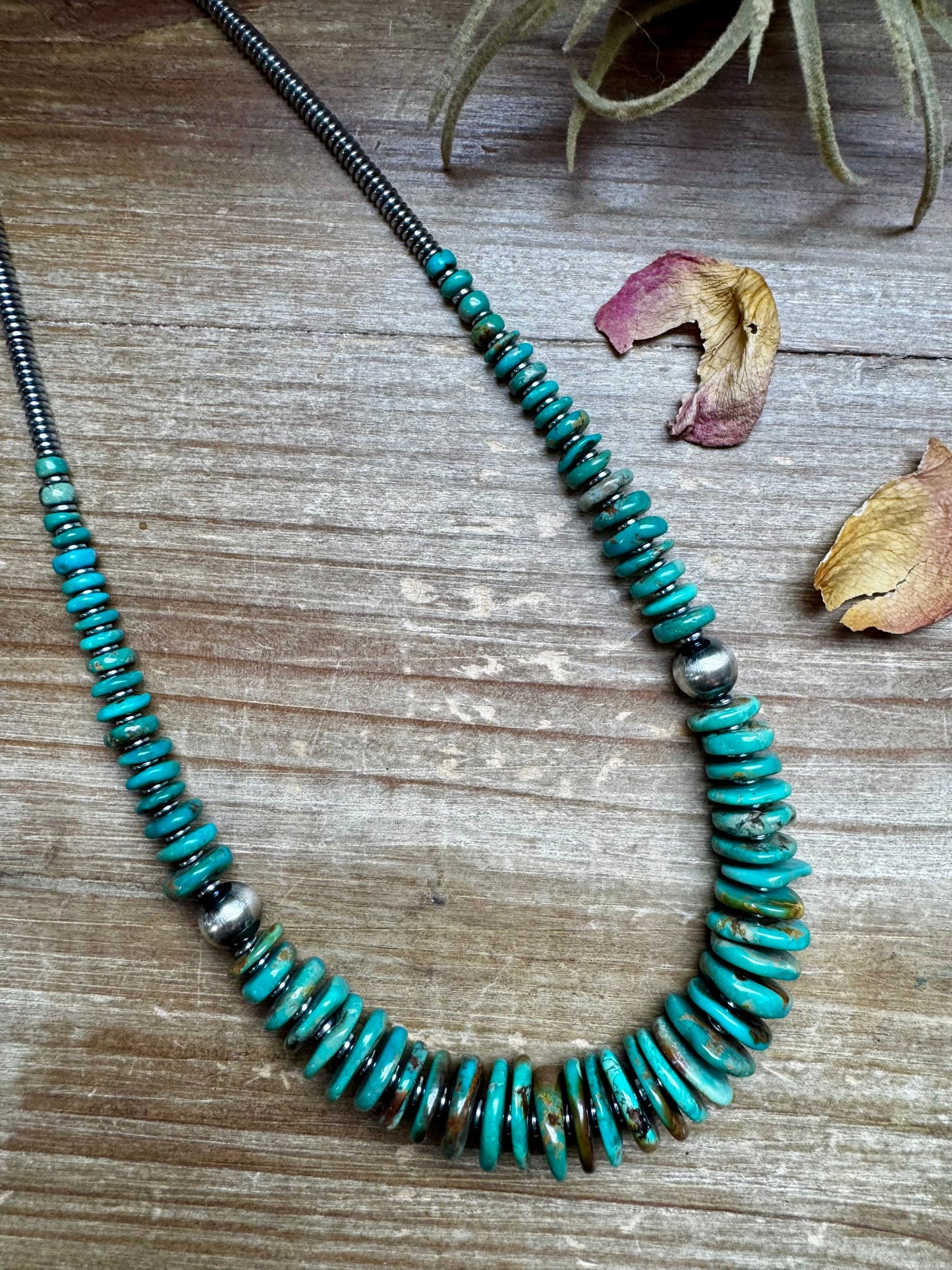 22 inch Graduated Green necklace with Sterling silver pearls