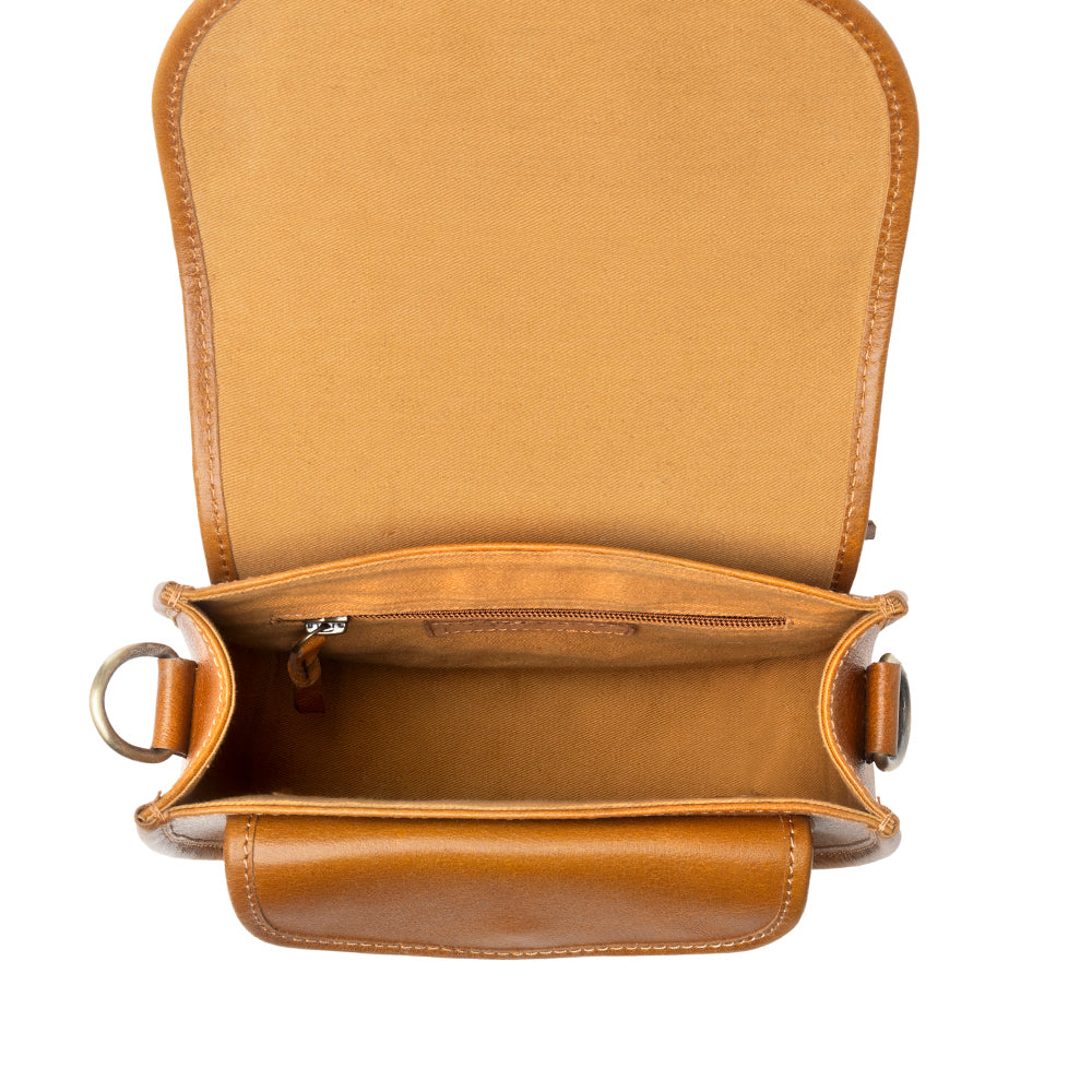 Myra Goldrush Saddle handtooled Bag for Women in saddle tan with hair-on detail