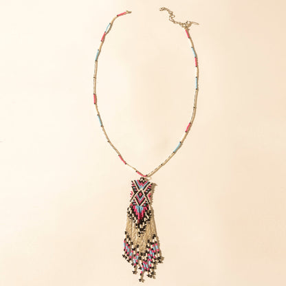 Myra Sky and Coral in necklace in Turquoise